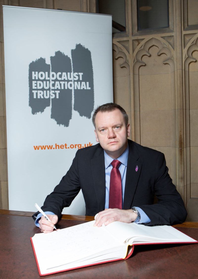 Nick Thomas-Symonds MP signing the Holocaust Educational Trust Book of Commitment 